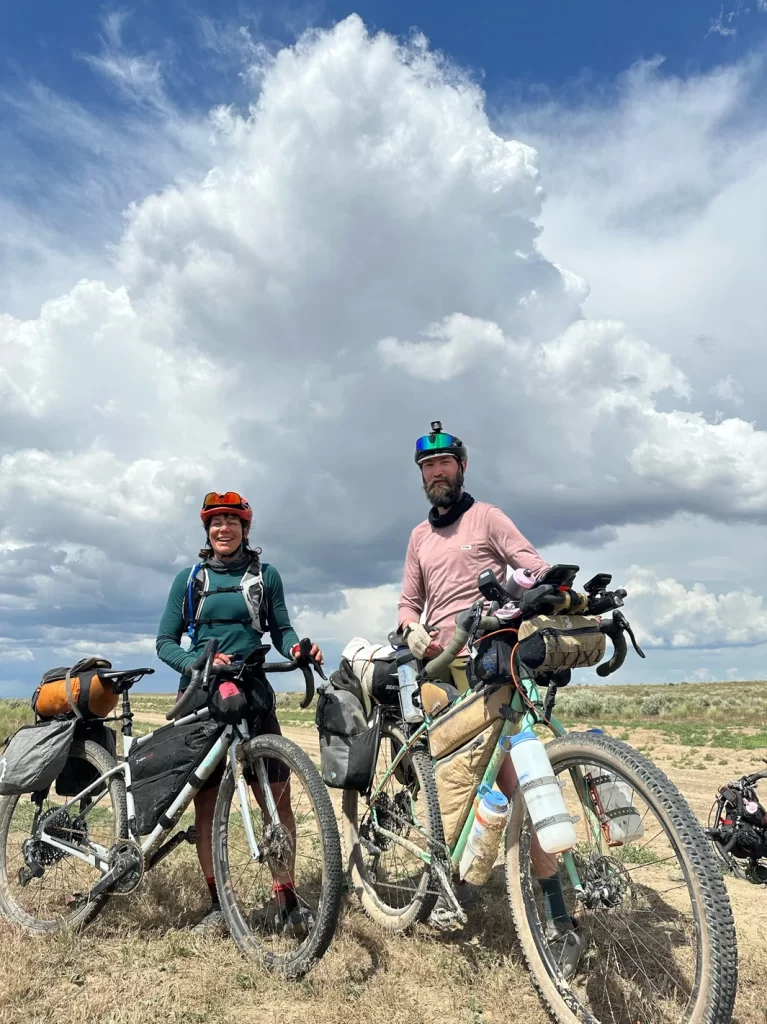 Rebecca Rusch and Aaron Couch while bikepacking through Craters of the Moon Preserve in Idaho