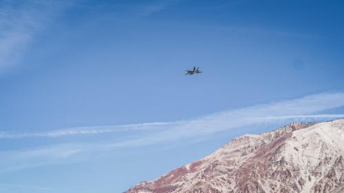 Low flying jet along Inyo Mountains in Owens Valley / China Lake