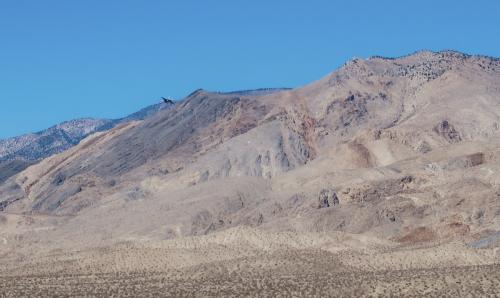 Low flying jet along Inyo Mountains in Owens Valley / China Lake