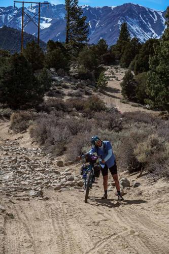 A short hike-a-bike through a rugged section of trail